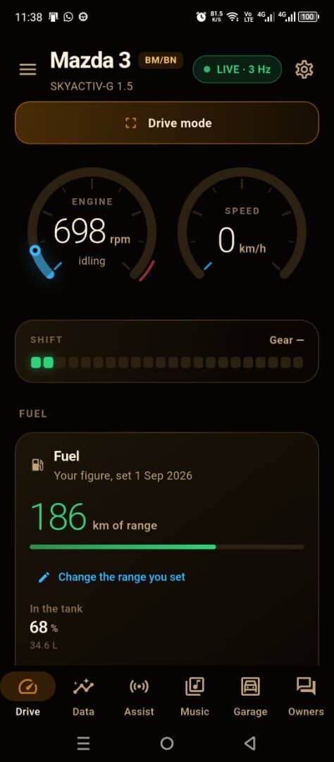 Drive tab: live engine and speed dials, shift indicator and fuel range